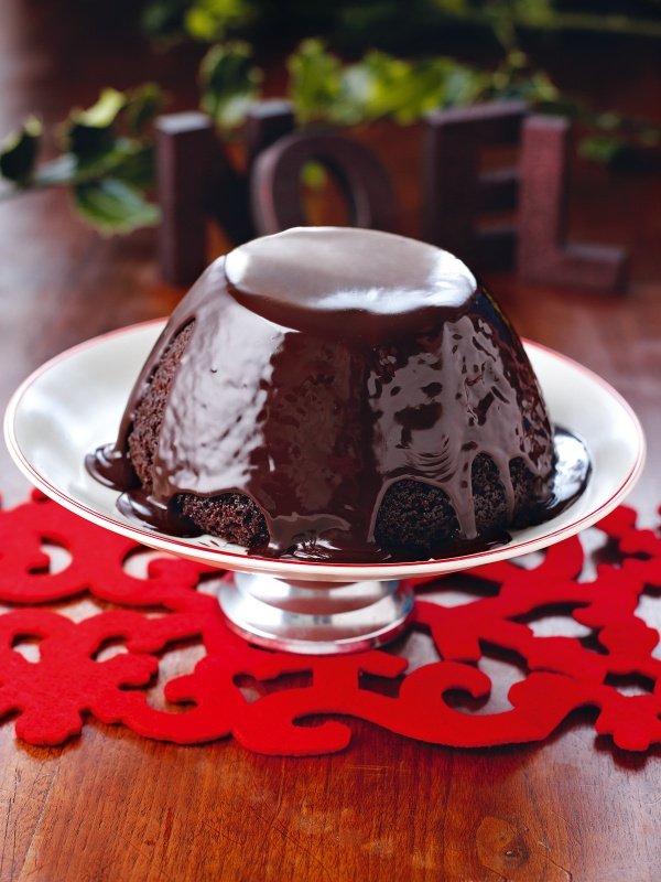 Chocolate pudding for Christmas 2021 with hot Chocolate sauce