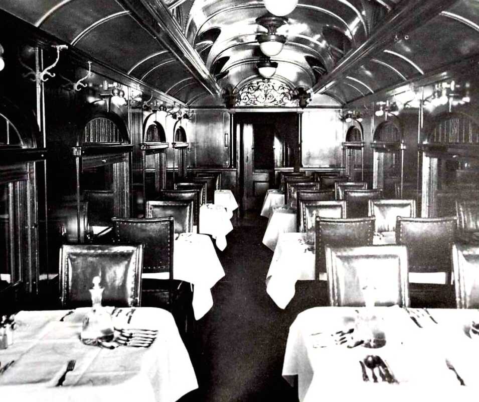 The elegant dining car of Southern Pacific's Shoreline Limited and the kitchen (right), circa 1900. American Railway Travel